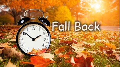 Fall Back with a clock in the distance.